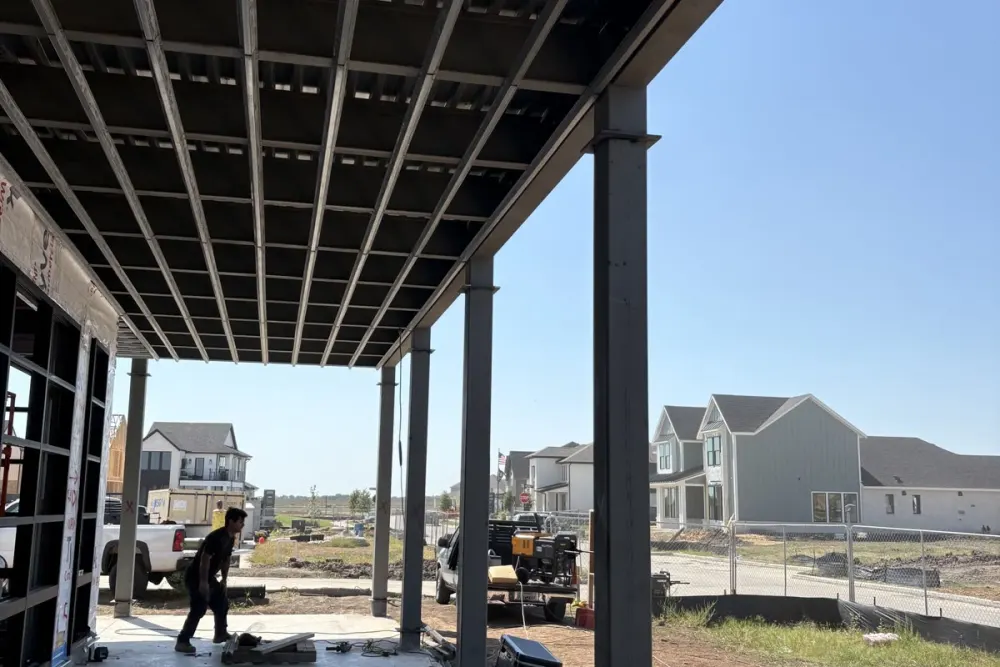 Steel columns and deck framing on a residential build at 1824 Austin Point